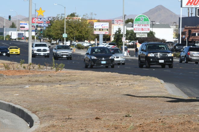 Trees recently cut down off a stretch of Seventh Street were either dead or in poor health as a result of drought-era water restrictions and their removal was also part of a broader beautification project for medians. [James Quigg, Daily Press]