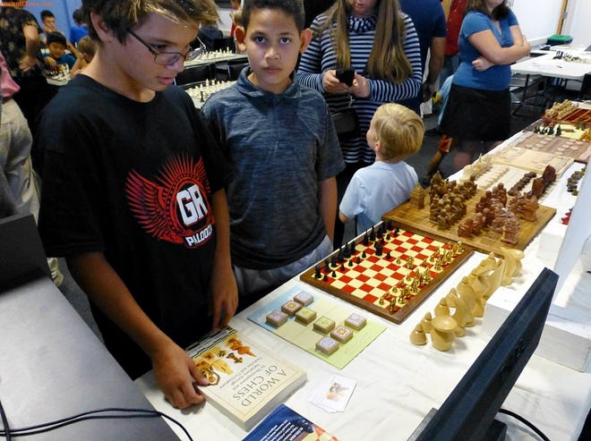 The Fruitville Library in Sarasota was the scene of the celebration of National Chess Day last week. Approximately 80 chess enthusiast attended several events. There was a rapid chess event for experienced players, two youth events for grades k-6 and grade 7-12, a simultaneous exhibition where a National Master played 16 people at the same time. Photo courtesy Mark Hamel.