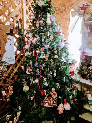 Pictured is Gradys Christmas Tree Farm’s snowman tree