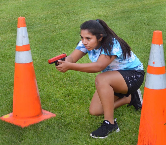 Diana Suarez-Manriquez of Pueblo Explorer Post #157 takes aim at the annual statewide Explorers conference and competition, held this summer in Gunnison.