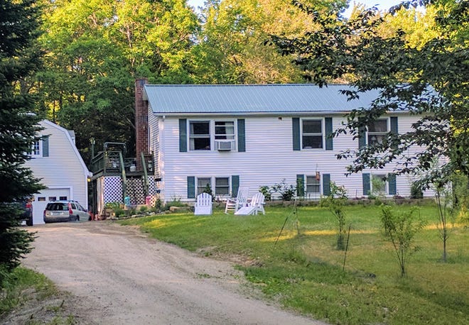 The New Hampshire Attorney General lost a suit against Dean Smoronk who owns the home at 979 Meaderboro Road in Farmington (pictured) to seize over $14,000 found during a search of the home after two women were found dead at the house in January. The judge ruled the suit was filed too late. [Photo by John Huff/Fosters.com file]