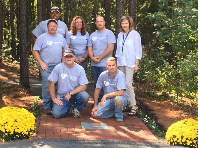 Volunteers from Celanese with Hospice Cleveland County CEO Myra McGinnis. [SUBMITTED PHOTO]
