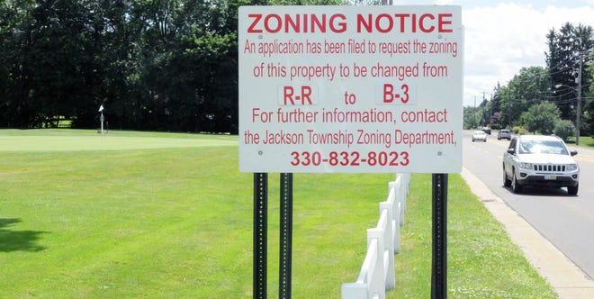 A sign posted along Everhard Road informs passing motorist about the requested zoning change at Tam O'Shanter golf course in Jackson Township. (CantonRep.com / Michael Balash)