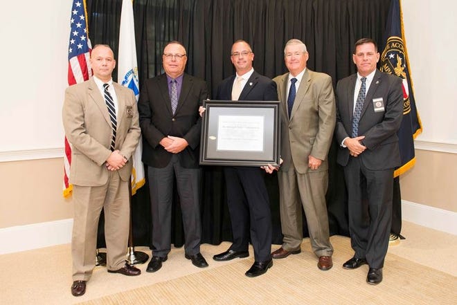 The Boxborough Police Department achieves State Certification from the Massachusetts Police Accreditation Commission at an awards ceremony held Oct. 12. Pictured, from left: MPAC Commissioner and Hamilton Police Chief Russ Stevens; Boxborough Police Lt. and Accreditation Manager Warren O'Brien; Boxborough Police Chief Warren Ryder; Boxborough Police Consultant Joe Roy, Westford Police Department; and MPAC Commission President and Duxbury Police Chief Matthew Clancy. [Courtesy Photo]