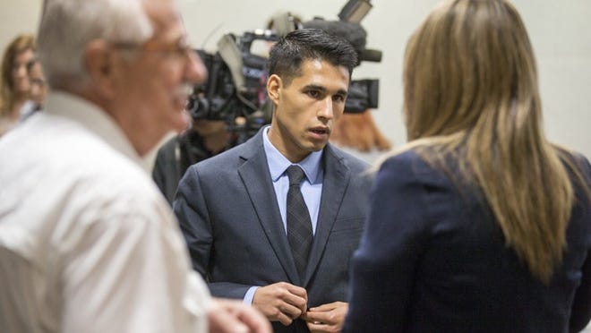 Bryan Canchola speaks with his attorney during a break in Judge David Wahlberg’s 167th district courtroom on Tuesday, Oct. 17, 2017. Bryan Canchola is charged with the murder of his boyfriend, Stephen Sylvester, during a fight at the apartment they shared near UT. Canchola is also accused of choking Sylvester’s dog, a Yorkshire terrier, Harlow. RICARDO B. BRAZZIELL / AMERICAN-STATESMAN