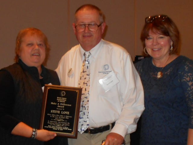 Pictured from the left are: Philicia L. Deckard Executive Director of the Brain Injury Association of Illinois, Steve Love, and Ginny Lazzara Chair of the Board of Directors of the Brain Injury Association of Illinois