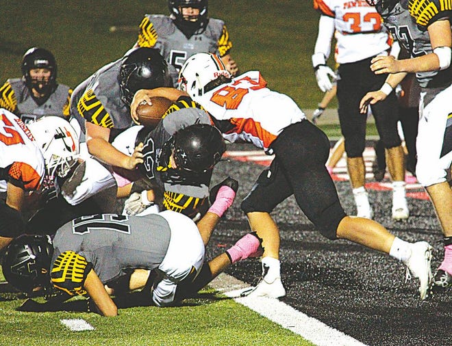 The Pawhuska defense stops Alva quarterback Stephen Willyard just short of the endzone in the fourth quarter of Thursday’s game. Chris Day/Journal-Capital