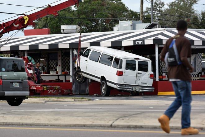 There were no injuries when a white Dodge Ram 3500 cargo van crashed into the northeast corner of The Hob Nob diner on Tuesday, Oct. 24, 2017. [HERALD-TRIBUNE STAFF PHOTO / CARLOS R. MUNOZ]
