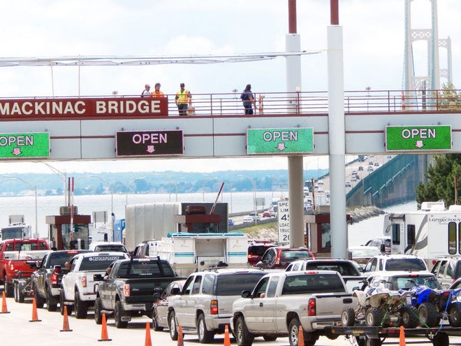 In this Sault News file photo, southbound cars line up at the Mackinac Bridge’s toll booths early Monday afternoon once the structure reopened to vehicles following the annual Labor Day bridge walk. Although some backups were reported, the Mackinac Bridge Authority seemingly avoided the traffic nightmare some had feared.