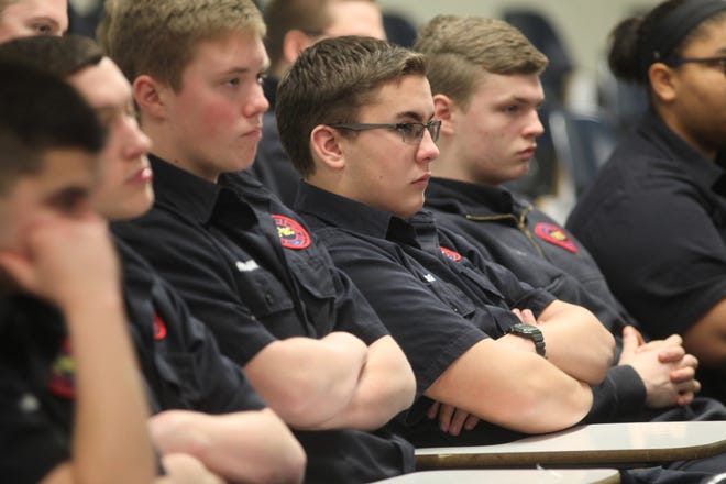 Columbus firefighter Mark Rine gives his "keep-your-gear-clean-and-avoid-cancer" presentation to a group of cadets at the Central Ohio Technical College campus in February, 2017.   (Columbus Dispatch photo by Doral Chenoweth III)