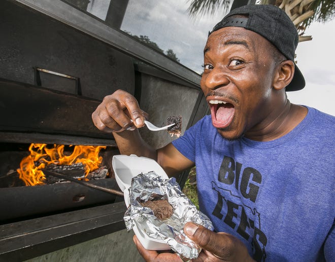 Rashad Jones prepares to take a bite of his burnt ends at Big Lee's Barbecue in Ocala in this July photo. He will appear on the Food Network's "Guy's Big Project." [Doug Engle/Staff photographer]