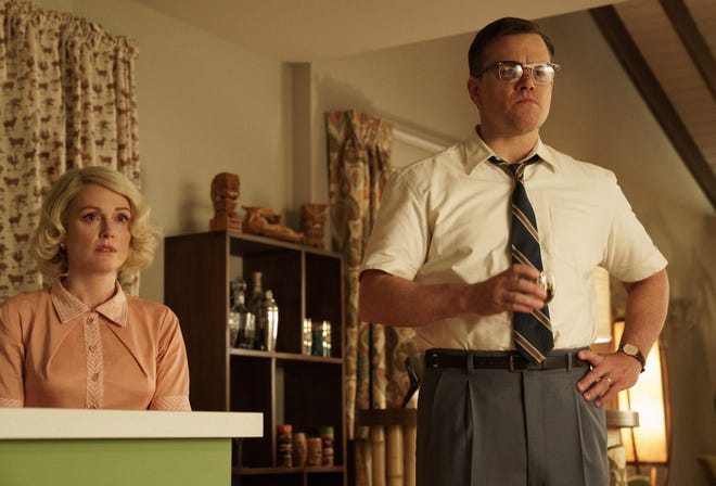 This image shows Julianne Moore, left, and Matt Damon in a scene from "Suburbicon." [Hilary Bronwyn Gayle/Paramount Pictures]