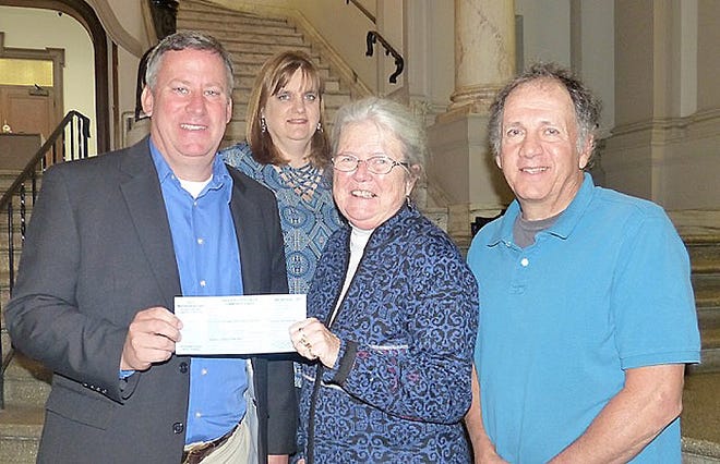 Little Falls Mayor Mark Blask receives a donor card for the Greater Little Falls Community Chest 2018 Campaign from Community Chest Board President Angela Harris, along with board members Patty Sklarz and Tony DeLuca. [SUBMITTED PHOTO]