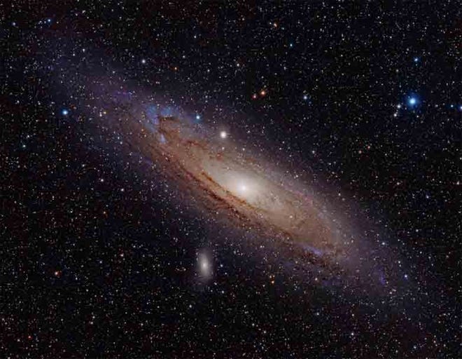 Andromeda Galaxy, M31, with its two brightest satellite galaxies.

Adam Evans/Wikimedia Commons