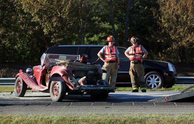 Clean up begins after a wreck in the northbound lane of I-85 near mile marker nine in Kings Mountain on Friday afternoon. At least one person was taken to the hospital. [Brittany Randolph/The Star]