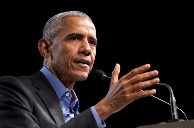 Former President Barack Obama gestures during a speech in Richmond, Va., on Oct. 19. [AP Photo/Steve Helber]