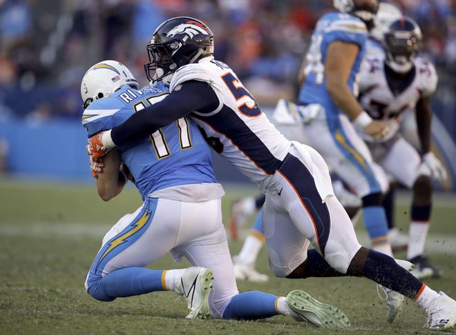 Los Angeles Chargers quarterback Philip Rivers, left, is sacked by Denver Broncos outside linebacker Von Miller during the second half of an NFL football game Sunday, Oct. 22, 2017, in Carson, Calif. (AP Photo/Jae C. Hong)