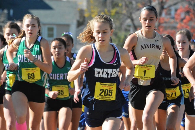 Exeter High School senior Jackie Gaughan won her third straight Division I title at Derryfield Park in Manchester in a time of 17 minutes, 41 seconds on Saturday. Gaughan also announced her decision to accept a full-ride scholarship offer from the University of Notre Dame.
[Mike Whaley/Fosters.com]