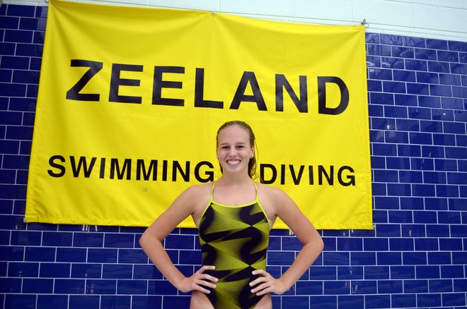 Taylor Hoeve is carrying on the "Hoeve legacy" at Zeeland swimming and is the last in a long family line of influential young women. [Dan D'Addona/Sentinel staff]