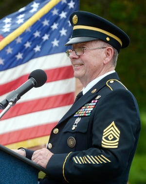 Retired Army First Sgt. Tom Rice speaks during a Memorial Day Ceremony at Beal Memorial Cemetery in Fort Walton Beach. [FILE PHOTO/DAILY NEWS]