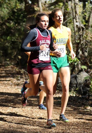 Salina Central senior Zoie Counts, left, ran a personal best 20:59.06 in her final meet and placed 44th at the 5A state cross country meet at Rim Rock Farm in Lawrence. [COURTESY PHOTO HUEY COUNTS]