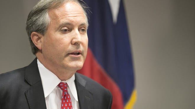 Texas Attorney General Ken Paxton has been charged with two counts of securities fraud and one count of failure to register with state securities regulators. JAY JANNER / AMERICAN-STATESMAN
