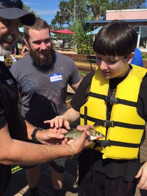 Henry Bonifacino participates in a fishing tournament for Lake Hills students. [SUBMITTED]