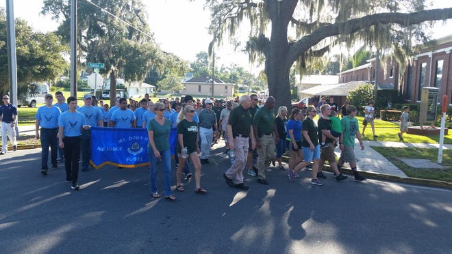 Approximately 500 people took part in last year's Law Enforcement Appreciation Walk hosted by the Lake County Sheriff's Office in Tavares. [Daily Commercial File]