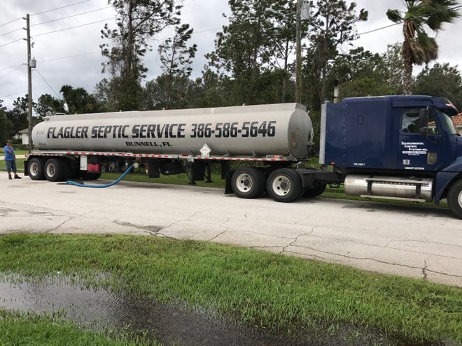 The city of Palm Coast has used large tanker trucks, like the one pictured, to help pump down the wastewater volume flowing through the city's wastewater system, spending $1.2 million on the pumping costs since early September. [Photo courtesy of City of Palm Coast]