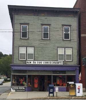 This Sept. 19, 2016, photo provided by the New Hampshire Preservation Alliance, shows the Parker J. Noyes Building in Lancaster. The building on Main Street, built in the 1860s and currently vacant, is one of the buildings on the 2017 "Seven to Save" list from New Hampshire Preservation Alliance. [Maggie Stier/New Hampshire Preservation Alliance via AP]