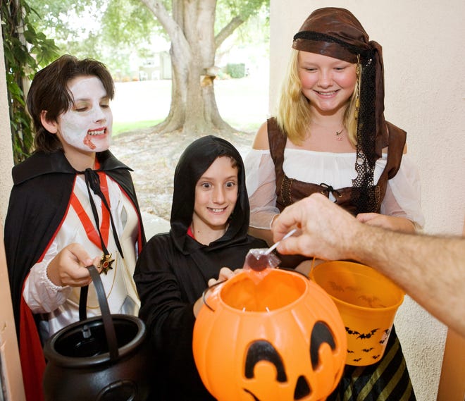 Should teenagers go trick-or-treating? It's a bedeviling topic. [Lisa F. Young/Dreamstime/TNS]