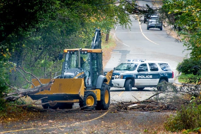Cohasset DPW crews and police in the area of Beechwood Street and Norman Todd Road removing a large tree that was blocking the roadway. [Courtesy Photo]