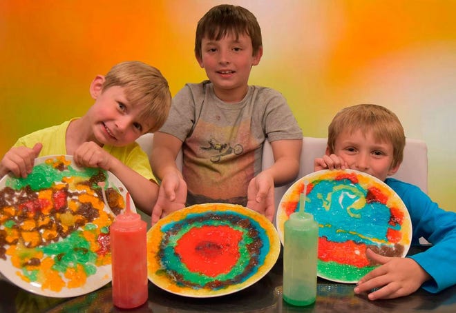 Indoor activities for children can be fun, especially when it involves playing with food and Sam, Aidan and Finn Kincaid all found out first hand with gummy art.