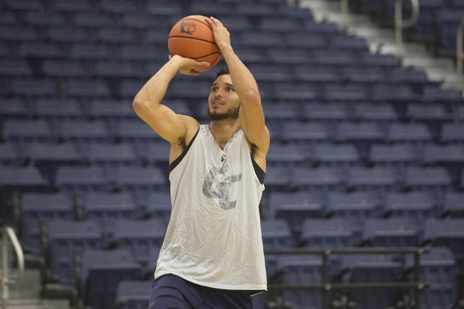 Josh Wade practices free throws at Gulf Coast State College on Tuesday. [JOSHUA BOUCHER/THE NEWS HERALD]