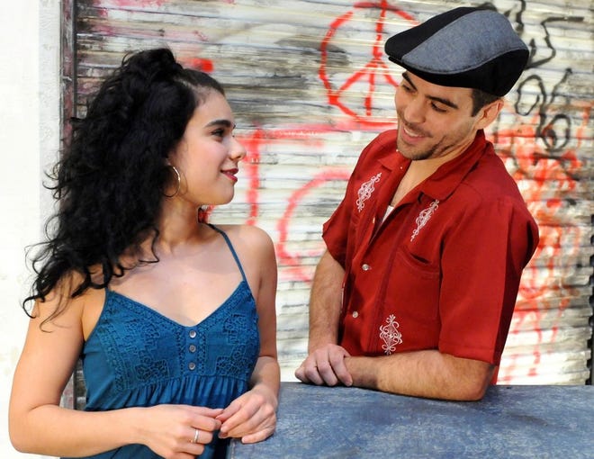 Iliana Garcia as Vanessa and Diego Klock-Perez as Usnavi in Wheelock Family Theatre's production of In The Heights by Lin-Manuel Miranda.
