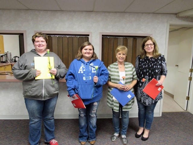 Roland Friends ‘n Service held an initiation of new members at their Oct. 10 meeting. New members pictured are Madison Ebrecht, Cassandra Matthews, Nancy Ebrecht and Ann Lorenger. Contributed photo