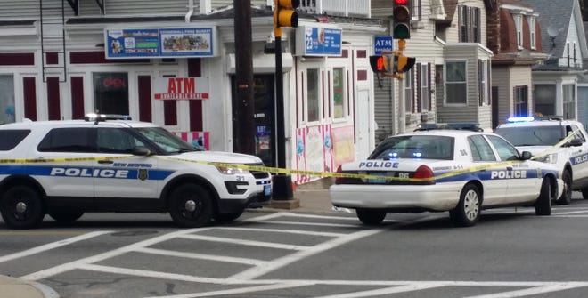 Uniformed officers are investigating a stabbing Wednesday on Coggeshall Street near County Street in New Bedford. [CURT BROWN/THE STANDARD-TIMES/SCMG]