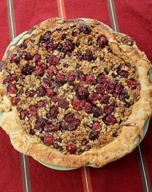 Cranberry Pomegranate Walnut Pie is an impressive, but simple holiday treat. [Courtesy photo]