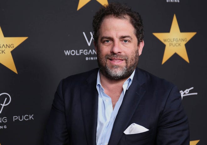 FILE - In this April 26, 2017 file photo, Brett Ratner arrives at the Wolfgang Puck’s Post-Hollywood Walk of Fame Star Ceremony Celebration in Beverly Hills, Calif. Hollywood’s widening sexual harassment crisis ensnared another prominent film director when six women, Including actress Olivia Munn, accused Ratner of harassment or misconduct in a Los Angeles Times report, on Wednesday, Nov. 1. (Photo by Willy Sanjuan/Invision/AP, File)