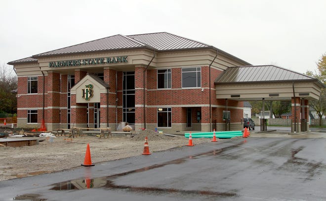Farmers State Bank will unveil its new headquarters building in West Salem during its open house on Saturday.