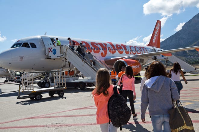 Travelers can hop around Europe quickly and cheaply using discount carriers like EasyJet. [photo by Dominic Arizona Bonuccelli]