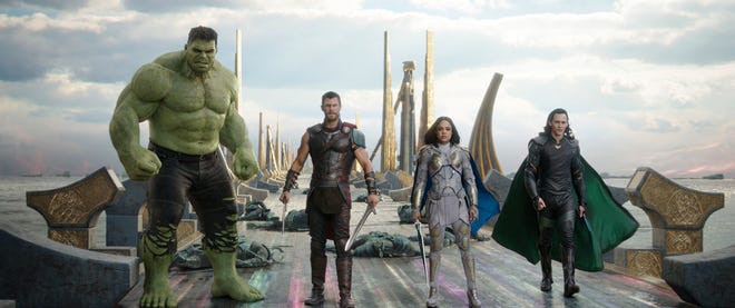 The Hulk, from left, Chris Hemsworth as Thor, Tessa Thompson as Valkyrie and Tom Hiddleston as Loki in a scene from, "Thor: Ragnarok." [Marvel Studios via AP]