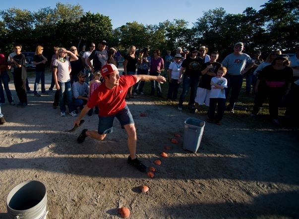 Don't miss the mullet toss during the annual Mullet Smoke-Off. [Courtesy photo]