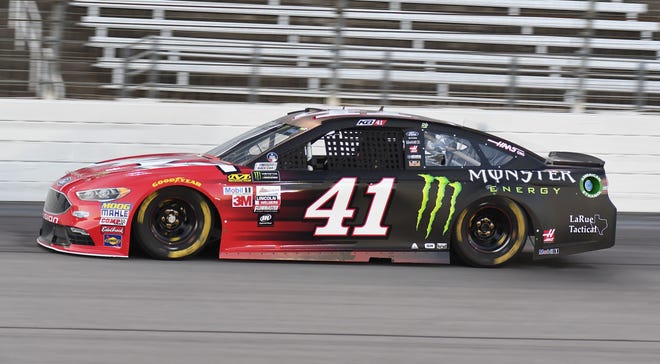 Kurt Busch (41) drives to take the pole position for a NASCAR Cup series auto race at Texas Motor Speedway in Fort Worth, Texas, Friday, Nov. 3, 2017.(AP Photo/Larry Papke)