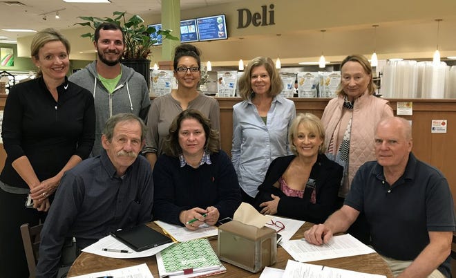 Members of the Duxbury Business Association's Holly Days Committee. 
Seated: Don Reed, Anne Antonellis, Debra Odier, Larry Nourse.
Standing: Brooke McDonough, Shawn Moloney, Lisa Fulton, Andi Dargin Schroeder and Laura Doherty
