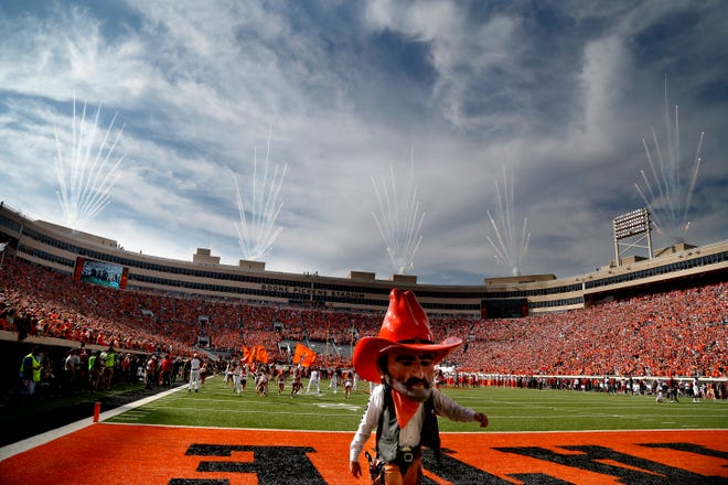 Pistol Pete walks off the field following introduction before the Bedlam college football game between the Oklahoma State Cowboys (OSU) and the Oklahoma Sooners (OU) at Boone Pickens Stadium in Stillwater, Okla., Saturday, Nov. 4, 2017. Photo by Sarah Phipps, The Oklahoman