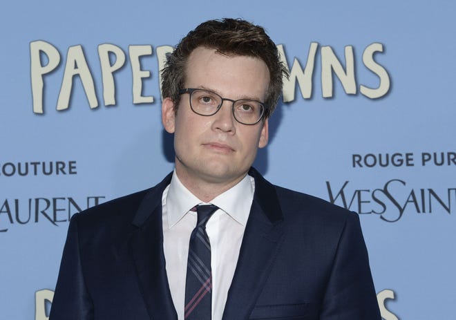 In this July 21, 2015, file photo, author John Green attends the premiere of "Paper Towns" in New York. [Evan Agostini/Invision/AP, File]