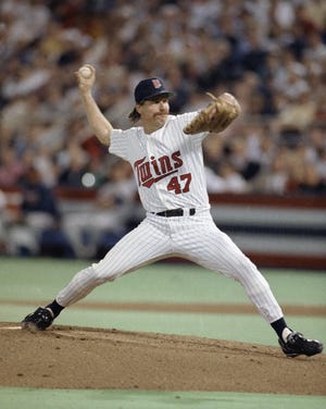 FILE - In this Oct. 27, 1991, file photo, Minnesota Twins' Jack Morris throws against the Atlanta Braves during the first inning of Game 7 of the baseball World Series in Minneapolis. The 1991 finale between the Twins and Braves was tense for different reasons. Morris pitched all 10 innings for Minnesota, and the Twins finally won 1-0 on Gene LarkinþÄôs bases-loaded single. (AP Photo/Jim Mone, File)