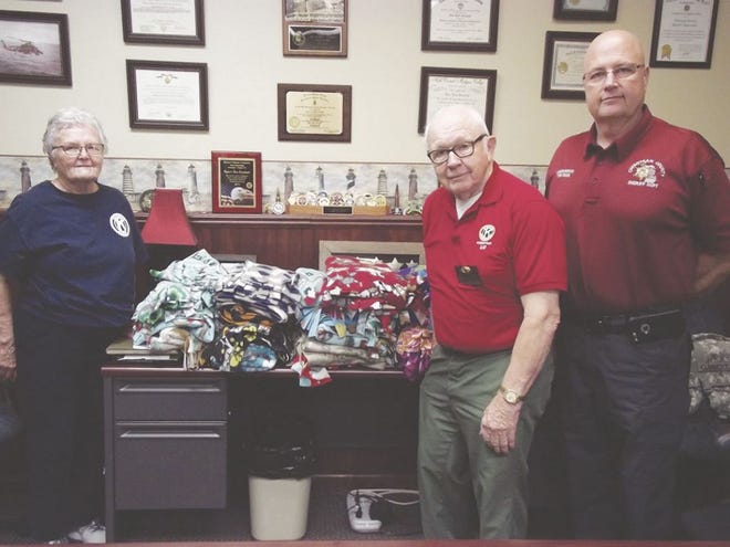 Elaine Carter and Lu Munger, of the Cheboygan Chapter of the Kiwanis Club, donated around 20 blankets to Cheboygan County Undersheriff Tim Cook and the Cheboygan County Sheriff's Department Monday afternoon.
