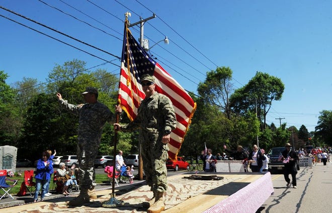 From left, US Army Chris Buckley, and US Navy Eric Cedrone, during the annual Raynham Memorial Day parade on Saturday, May 23, 2015.